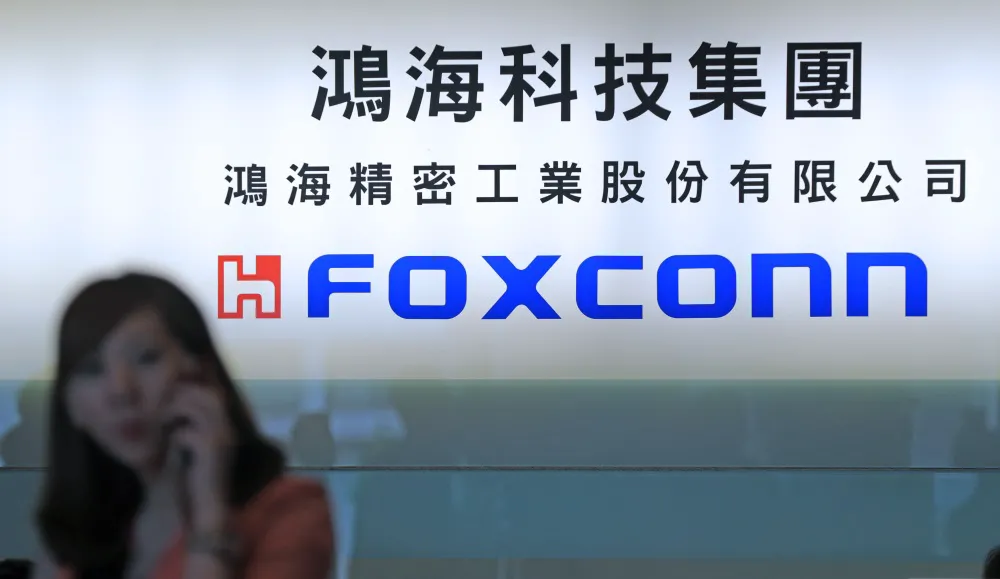 Foxconn hứa thưởng tiền 1.400 USD hòng xoa dịu bạo loạn Foxconn hứa thưởng tiền 1.400 USD hòng xoa dịu bạo loạn